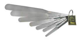 Albion 958-G01 spatula set collection with seven pieces for precise caulk smoothing.