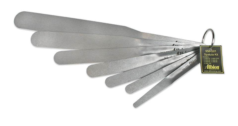 Albion 958-G01 spatula set collection with seven pieces for precise caulk smoothing.