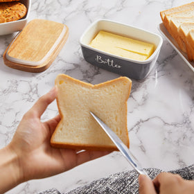 Two sticks of butter fit securely in the 6.5 x 4 inch base