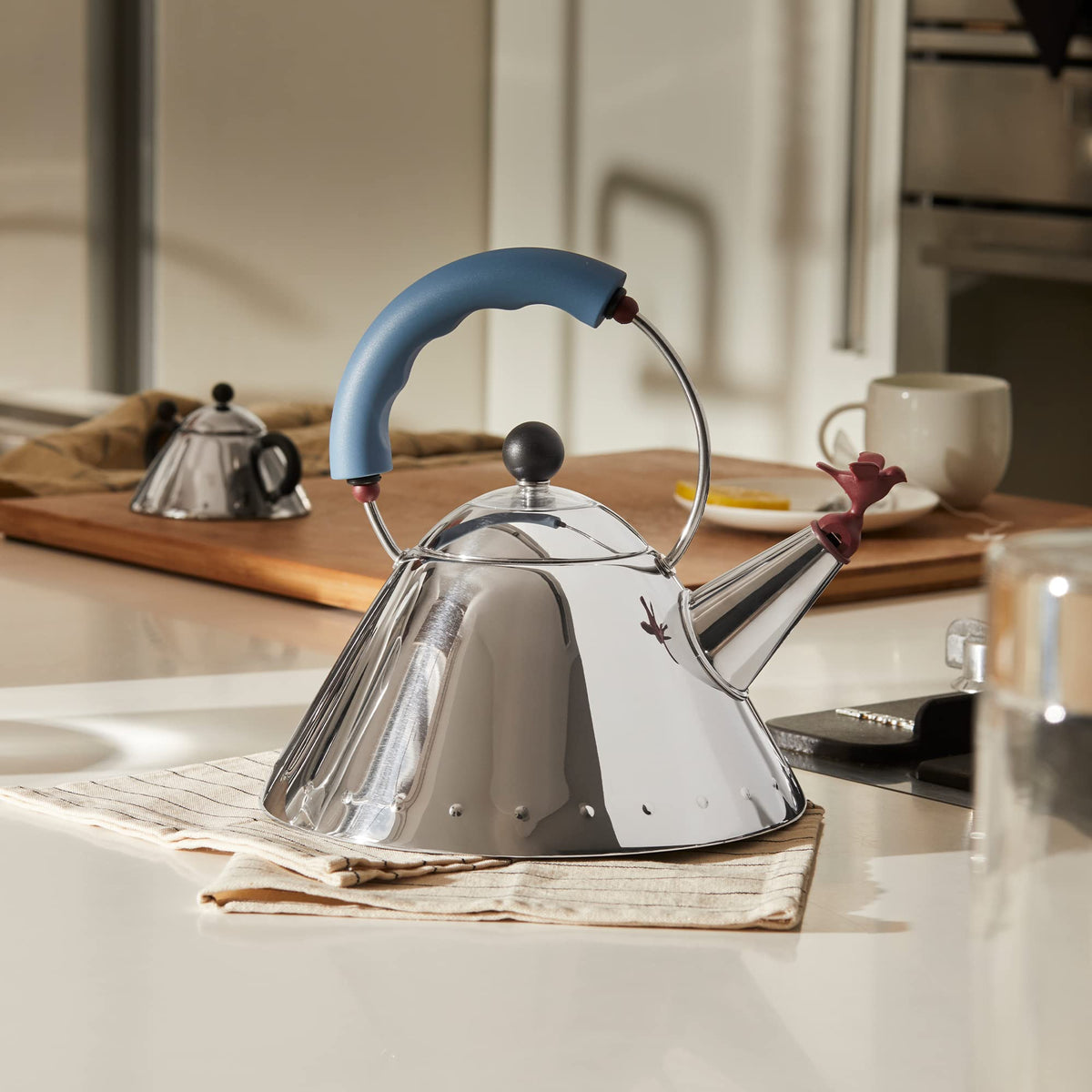 Alessi 9093 top view highlighting gas and induction compatibility.