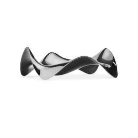 Alessi Blip PG02 spoon rest with mirror finish keeps countertops tidy and stylish.