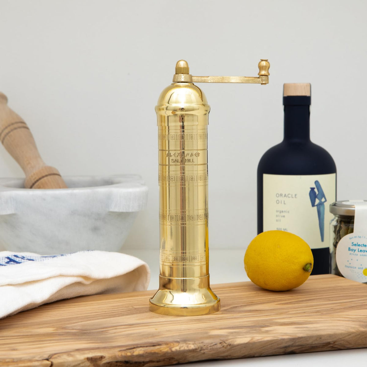 Alexander Home brass mill base provides stable grinding on the countertop.