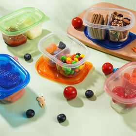 ALFEVA double-compartment snack box with separated compartments to prevent mixing.