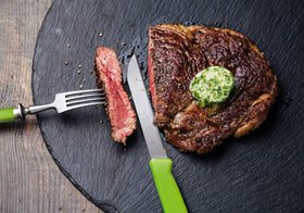 Alfi serrated knife close-up showing durable, versatile slicing for bread and produce.