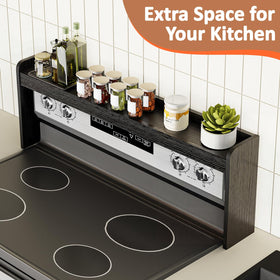 Alfrufy spice jars on stove top shelf keep essentials within reach during cooking.