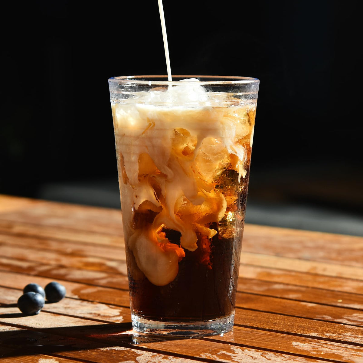 ALINK ribbed 16 oz highball filled with a cocktail, ready for entertaining
