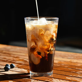 ALINK ribbed 16 oz highball filled with a cocktail, ready for entertaining