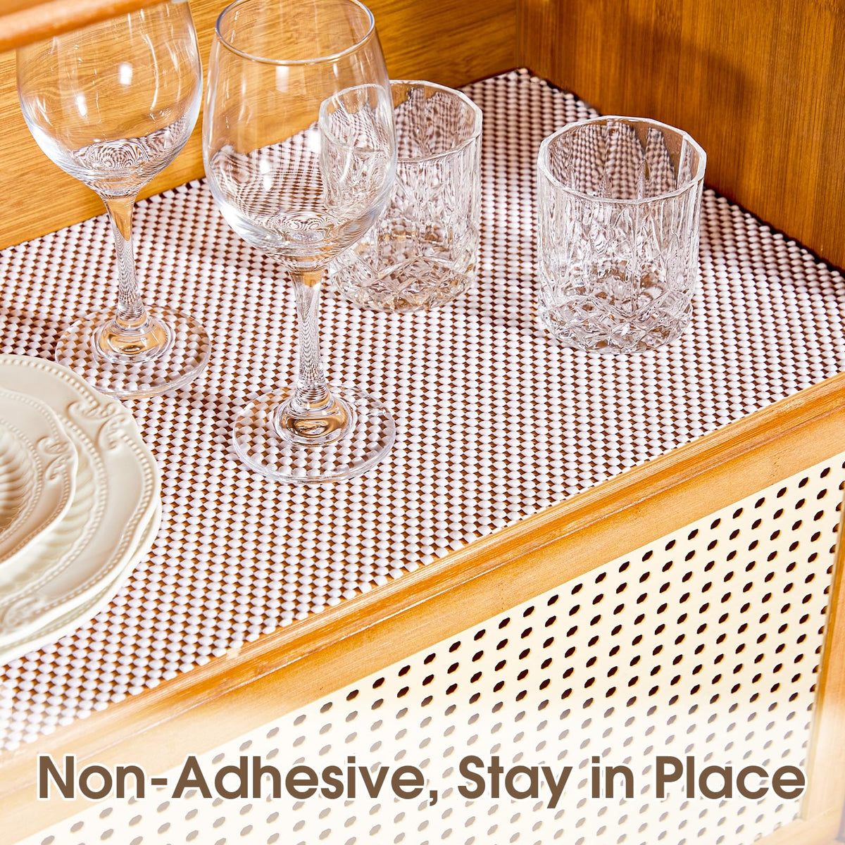 ALIUNI shelf liner cut to fit a drawer for organized utensils and spices.