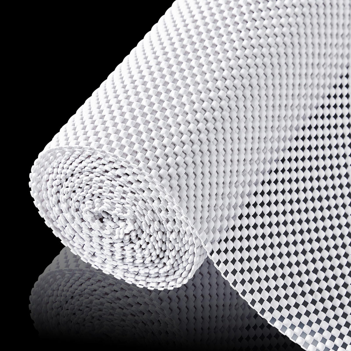ALIUNI shelf liner unrolled in a kitchen cabinet shows non-slip grip and surface protection.