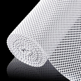 ALIUNI shelf liner unrolled in a kitchen cabinet shows non-slip grip and surface protection.