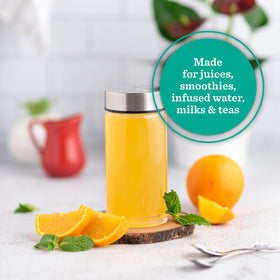 All About Juicing four-pack packaging highlights reusable glass bottles