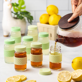 All About Juicing 8-pack shot bottles with color-coordinated lids
