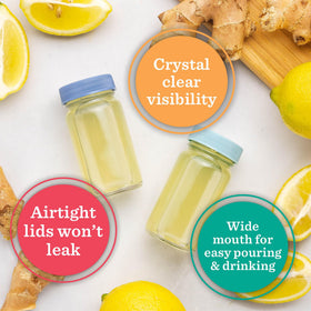 All About Juicing crystal-clear 2 oz glass bottle showing contents.