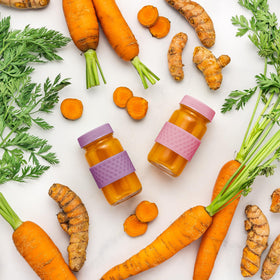 All About Juicing reusable glass bottle that is dishwasher safe and chemical-free.
