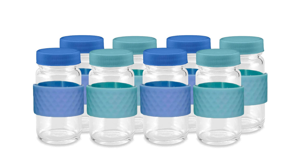 All About Juicing glass shot bottle with cap for on-the-go use.