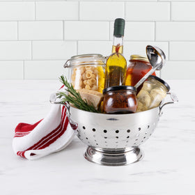 All-Clad colander pour edge demonstrates rolled rim for drip-free pouring.