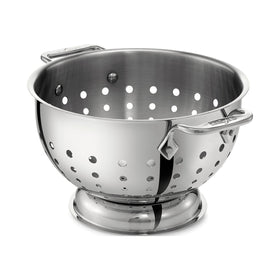 All-Clad 5-quart colander top view with mirror finish for fast draining vegetables.