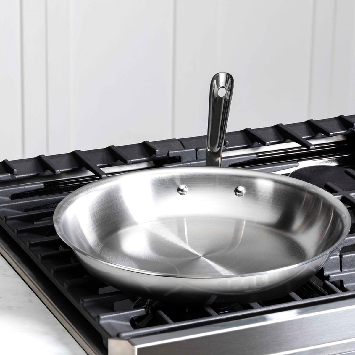All-Clad D3 tri-ply construction with aluminum core and stainless steel layers