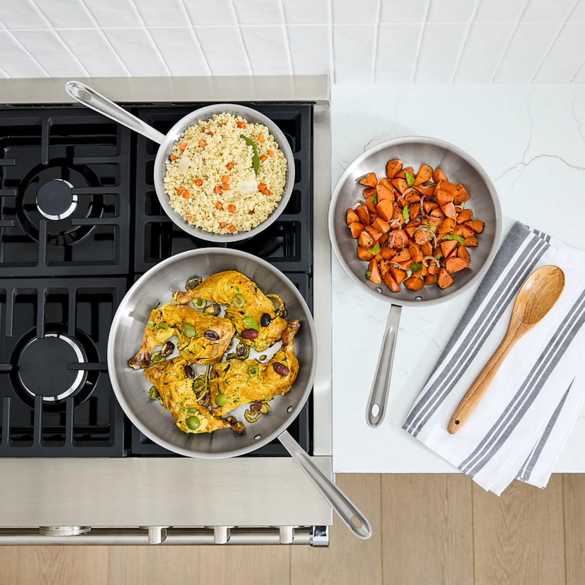 All-Clad D5 double-riveted handles provide a secure grip during cooking.