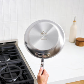All-Clad D5 flared rims support drip-free pouring