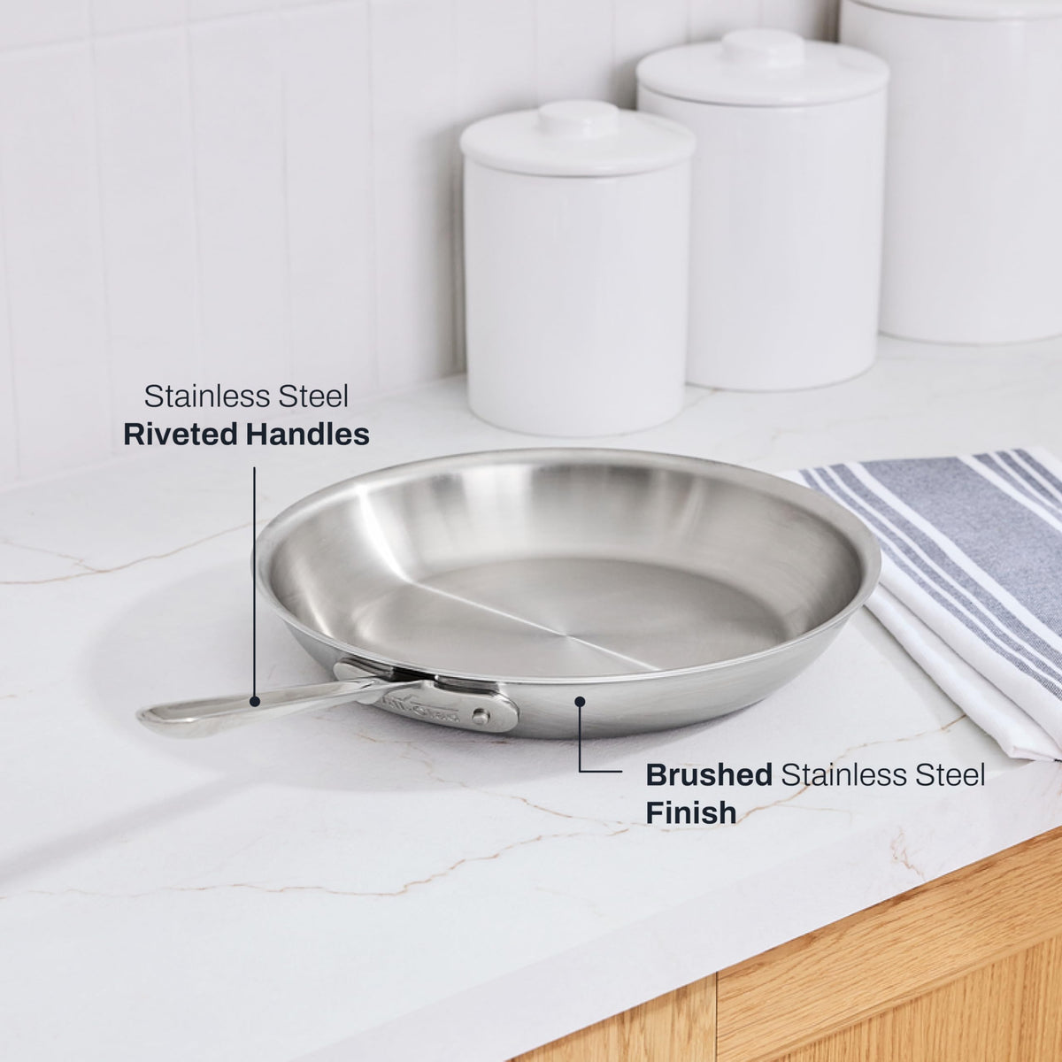 All-Clad D5 heat-tolerant stainless-steel handle with rivets