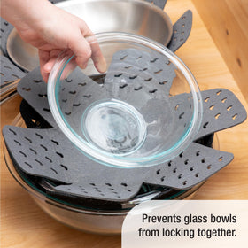 All-Clad dish drying mat absorbs moisture quickly for a tidy counter.