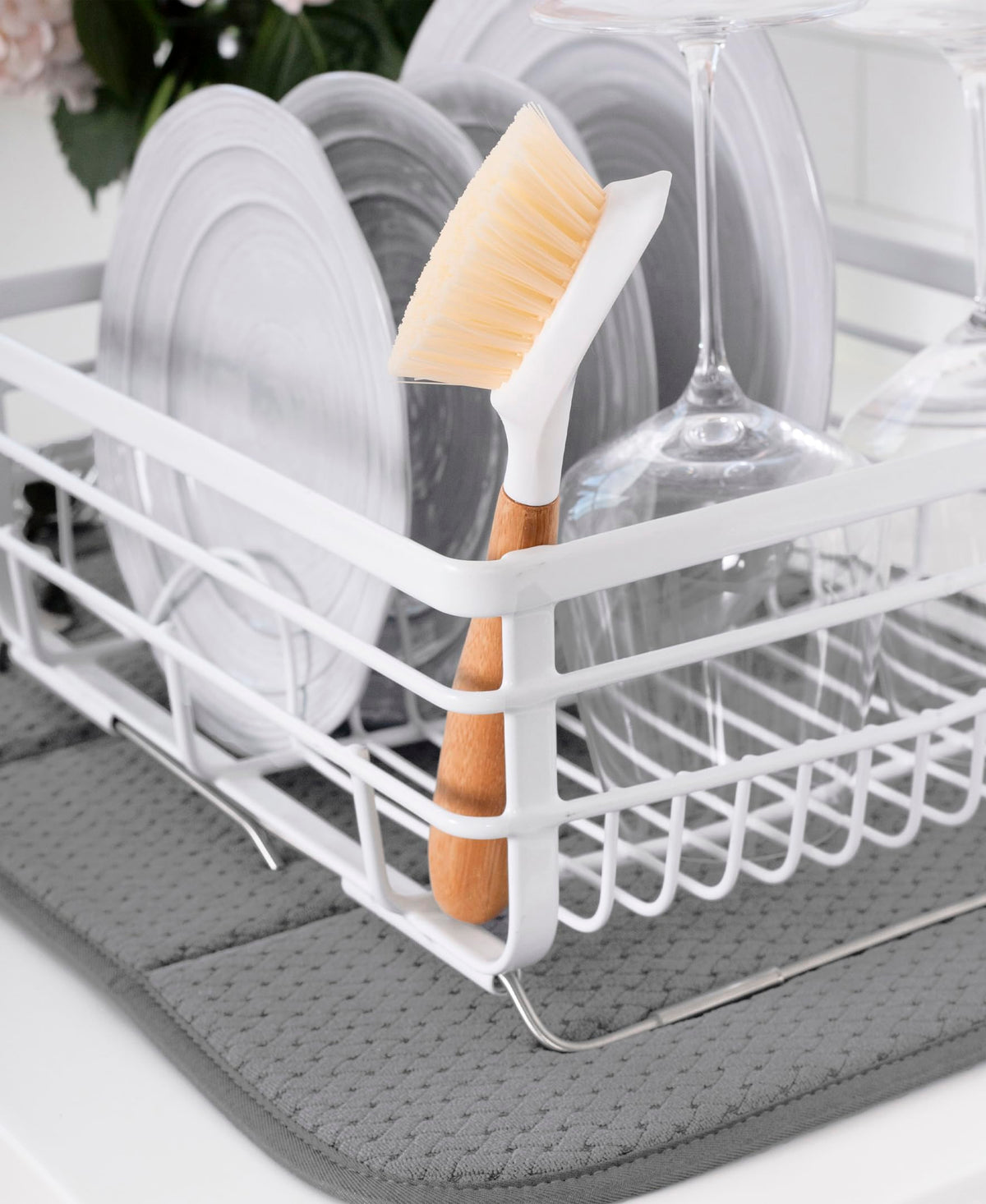 All-Clad drying mat folded for compact storage after use.
