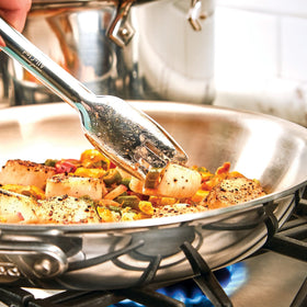 All-Clad dishwasher-safe tongs simplify cleanup after family meals.