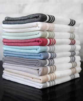 All-Clad three-pack Rainfall towels on display match modern decor.