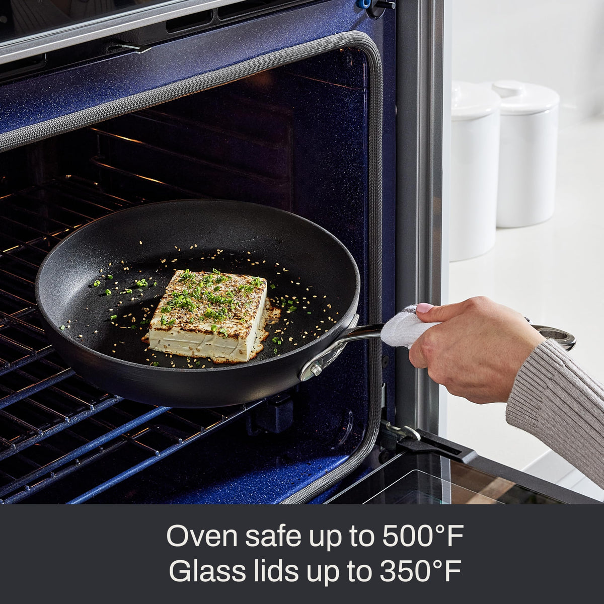 All-Clad HA1 grill pan with contoured double-riveted handles for secure grip.
