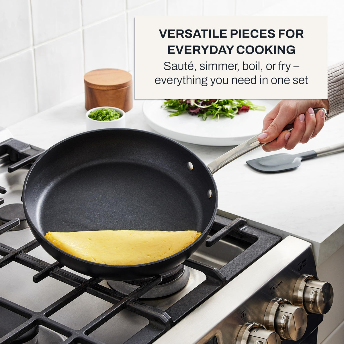 All-Clad HA1 fry pan glass lid for monitoring without heat loss.