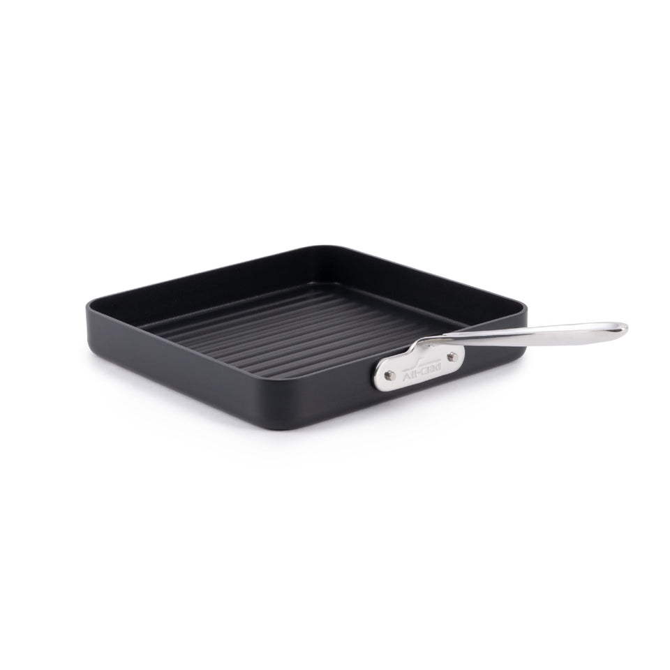 All-Clad HA1 grill pan 11x11 inch surface for even searing.