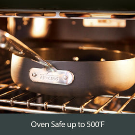 All-Clad HA1 heavy-gauge aluminum ensures even heat distribution.