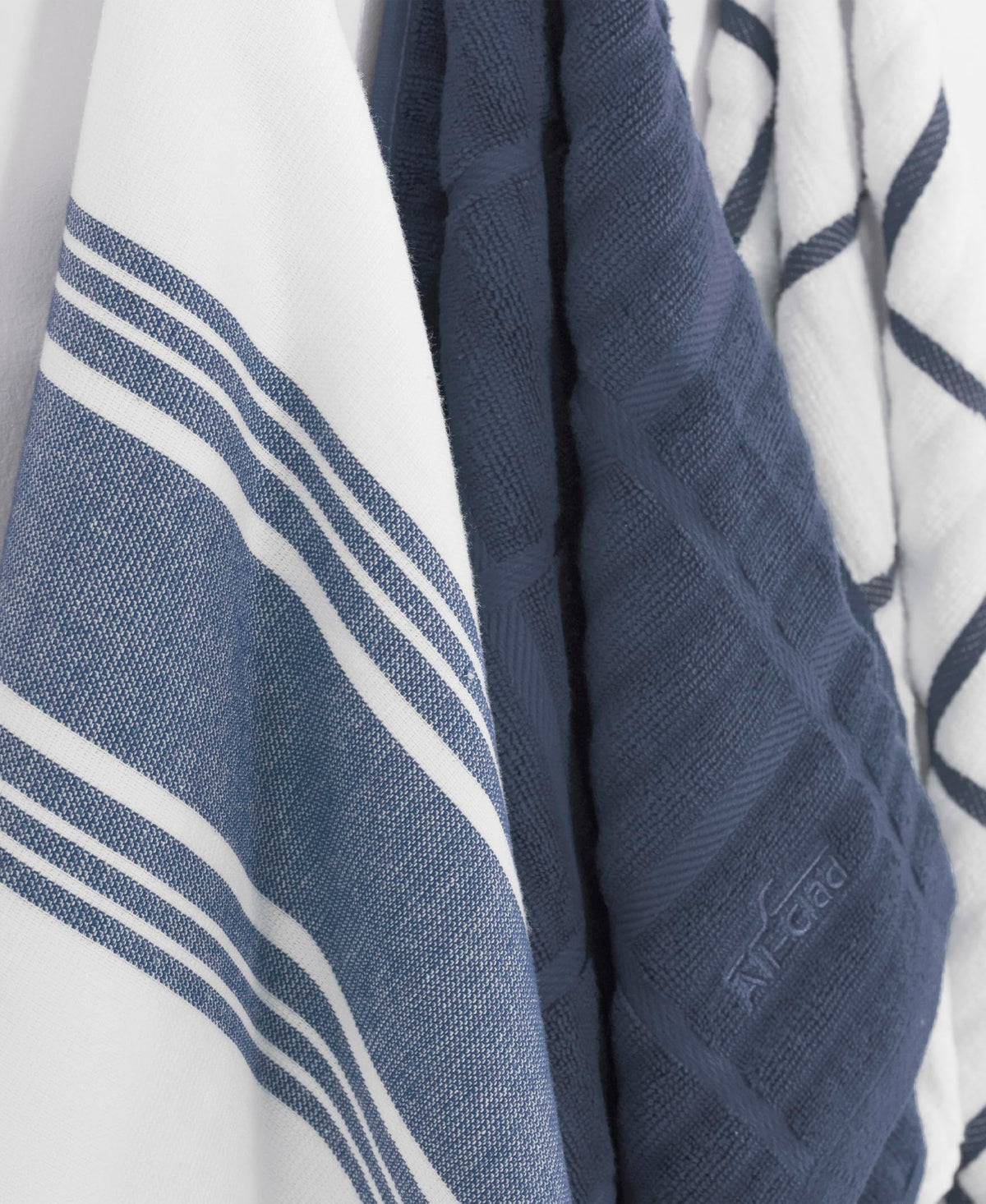 All-Clad towels with hanging loop keep essentials within reach.