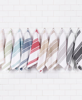 All-Clad machine-washable kitchen towels simplify maintenance and reuse.