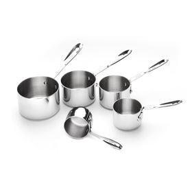 All-Clad measuring cups set inside a flour bag showing compact form for easy baking prep.