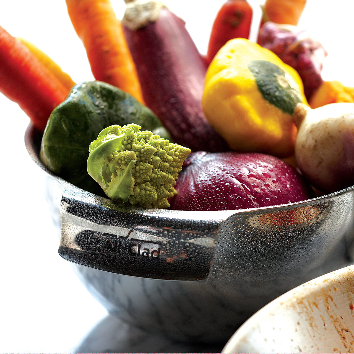 All-Clad mixing bowls dishwasher-safe finish ensures easy cleaning.