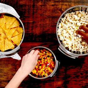 All-Clad mixing bowls nesting design illustrates space-saving storage.