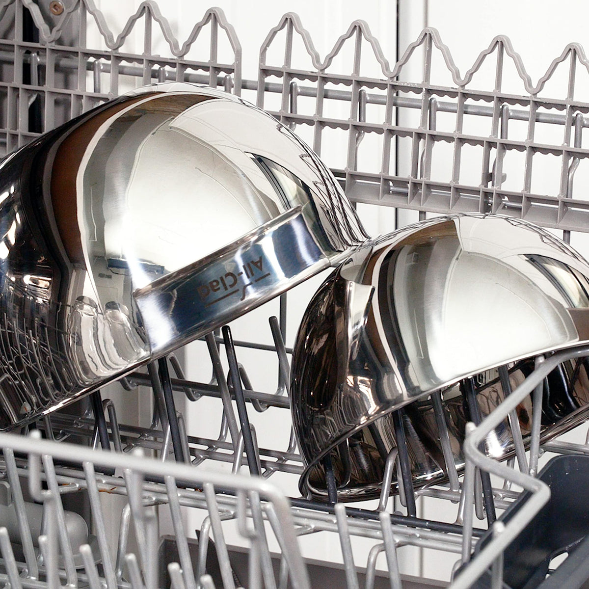 All-Clad mixing bowls polished stainless steel finish boosts durability.
