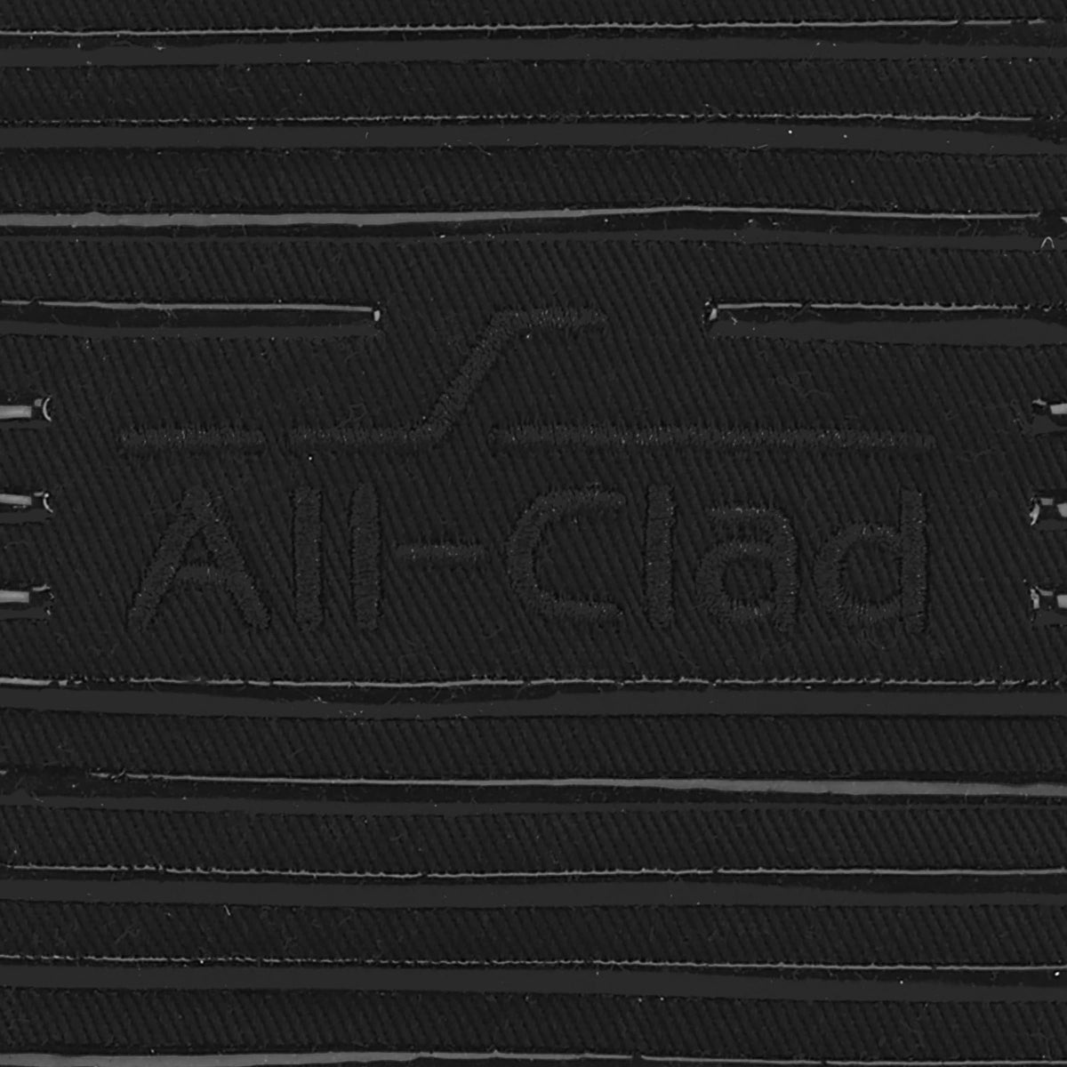 All-Clad heavyweight cotton twill with silicone on both sides offers durable, flexible protection.