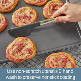 All-Clad Pro-Release 8x8 pan heavy-gauge aluminized steel for warp resistance and even heat.
