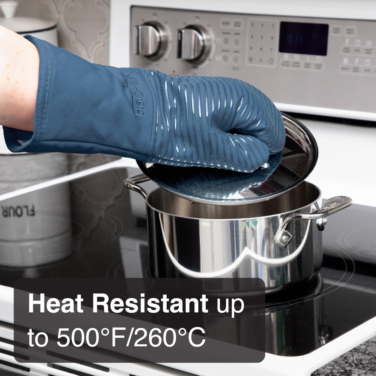 All-Clad indigo oven mitts are dishwasher-safe for easy cleaning.