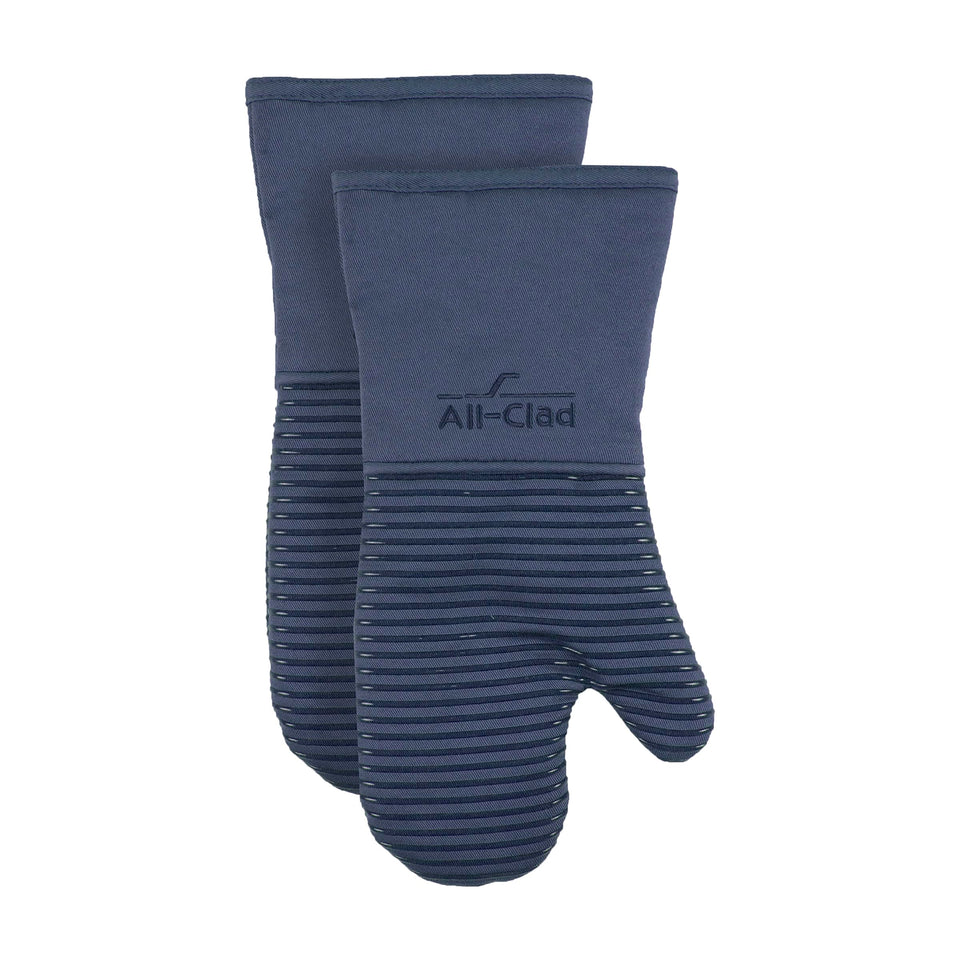 All-Clad indigo oven mitts with textured grip for secure handling of hot cookware.