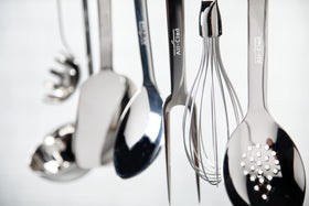 All-Clad slotted turner ideal for delicate foods like eggs.