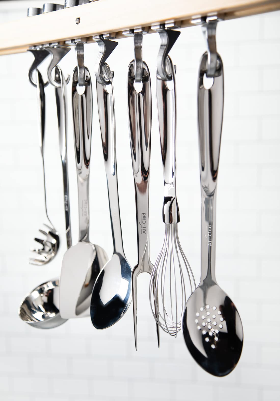 All-Clad slotted turner ergonomic handle provides comfortable grip.
