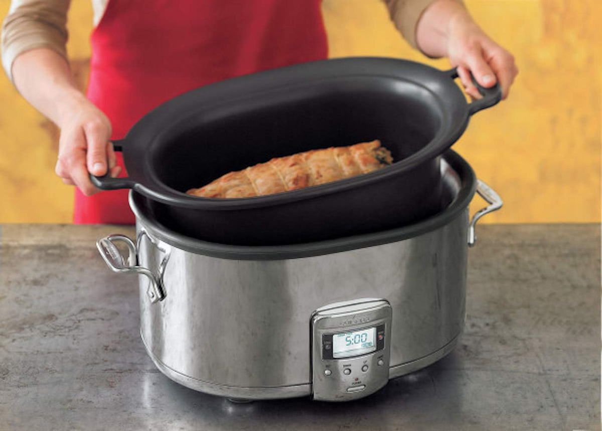 All-Clad stainless-steel lid traps moisture for flavorful meals.