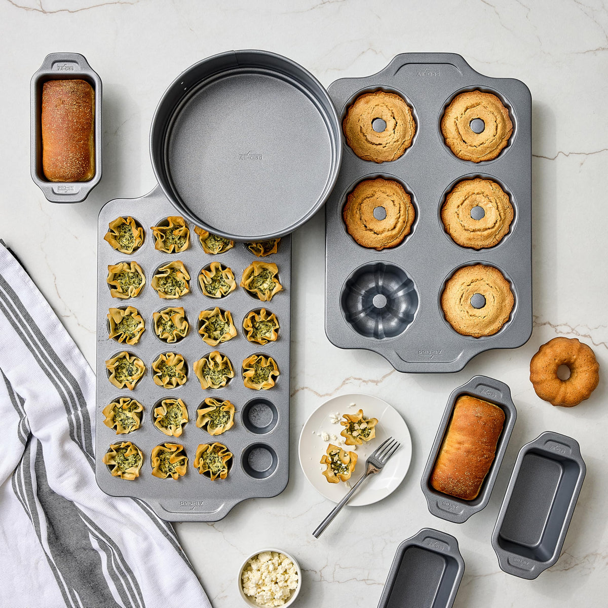 All-Clad 9-inch oven-safe to 450°F suitable for multiple baking tasks