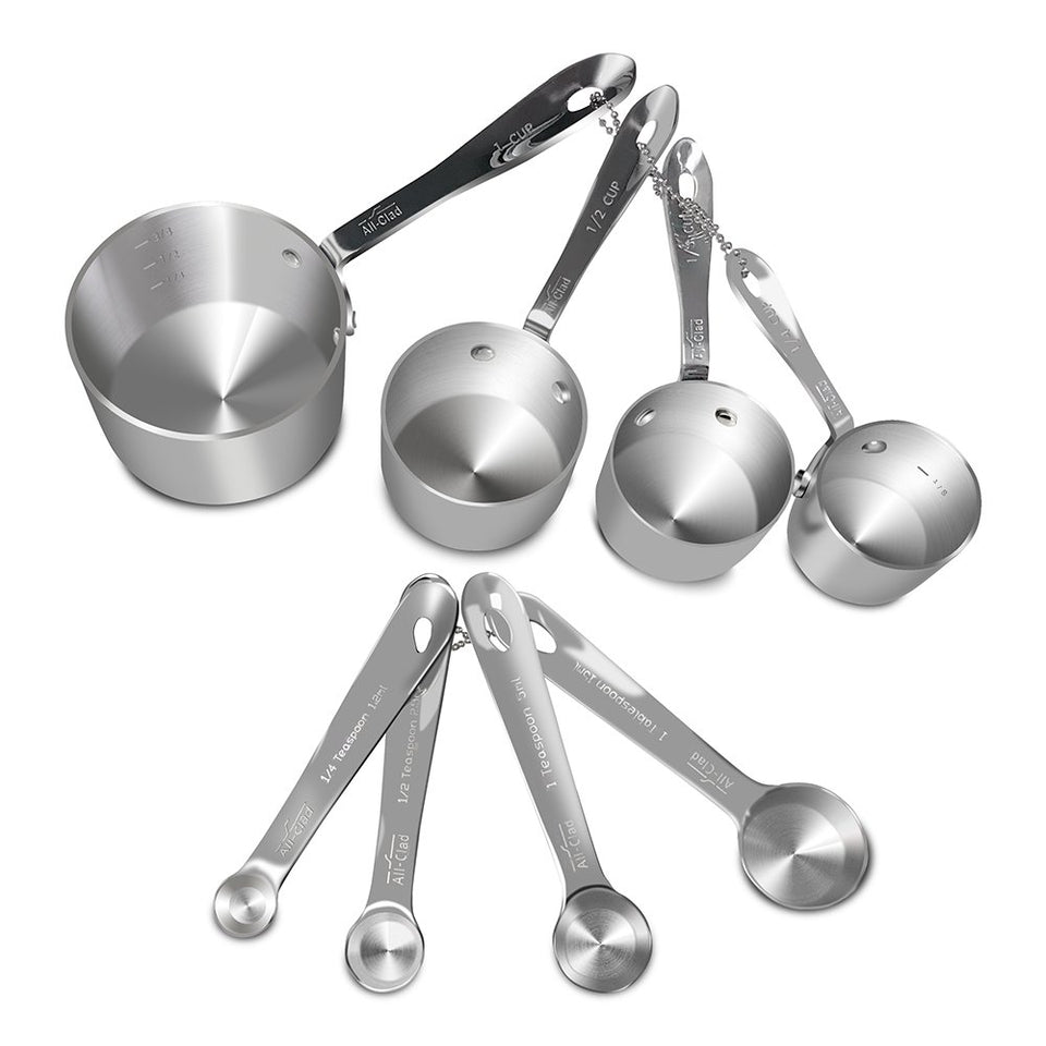 All-Clad 8pc stainless steel measuring cup and spoon set displayed for precise cooking