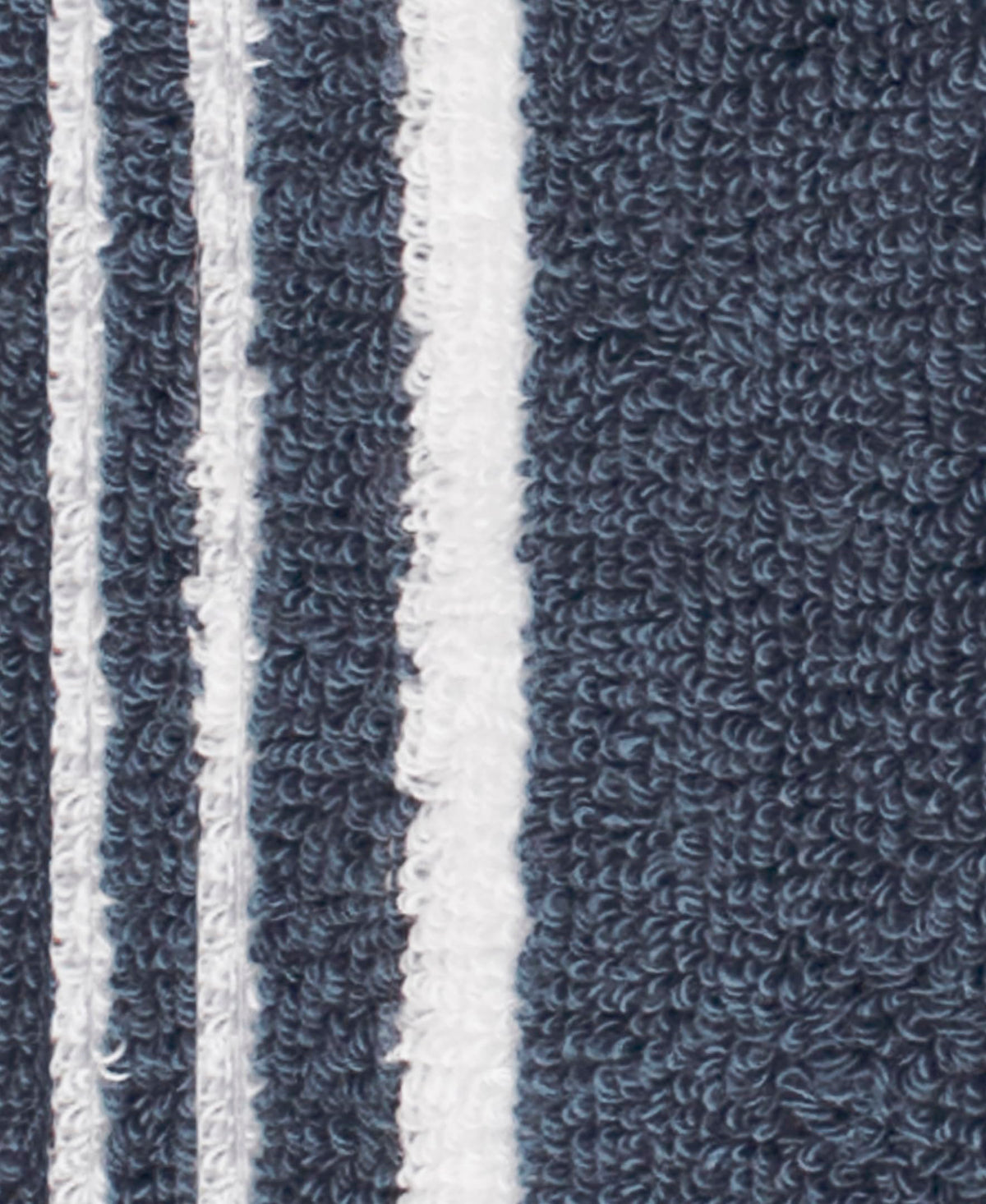 All-Clad terry-weave absorbent side soaks up spills quickly.
