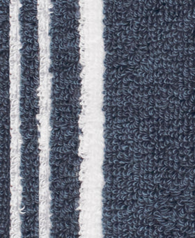 All-Clad terry-weave absorbent side soaks up spills quickly.
